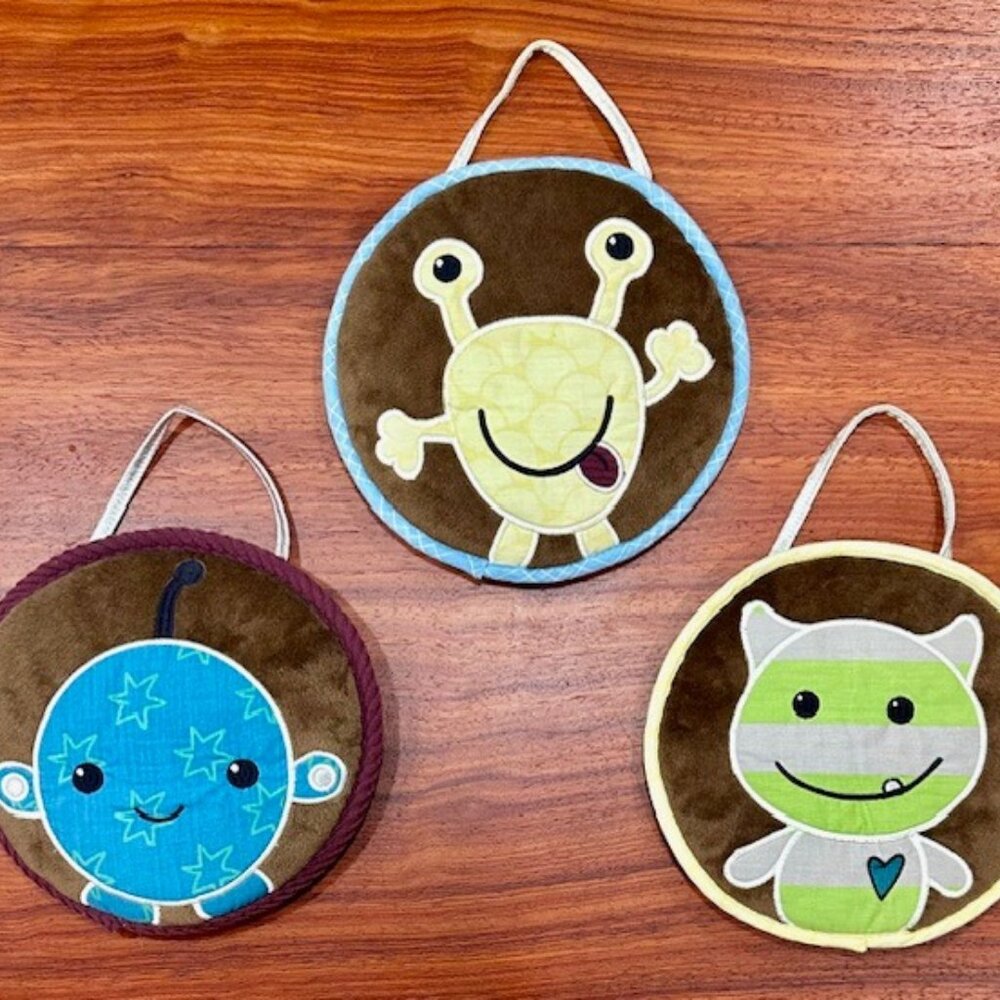 Set of Three Cocalo Baby Peek-a-Boo Monsters Round Plush Wall Art Decor